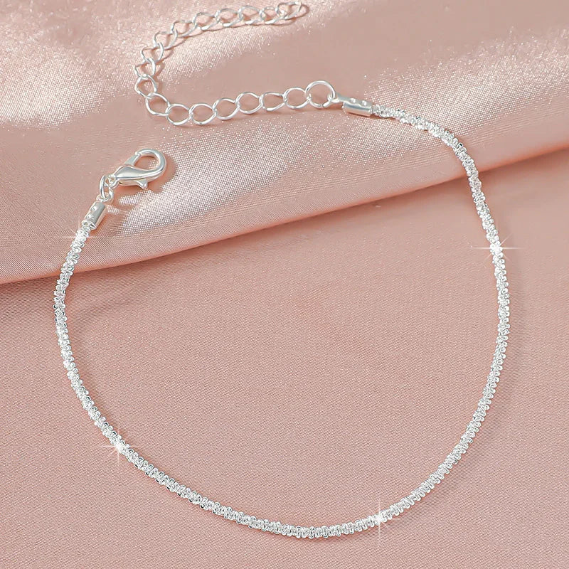 Sparkling Silver Color Twisted Chain Anklet Hypoallergenic Shiny Foot Bracelet Summer Beach Jewelry With Black Storage Pouch